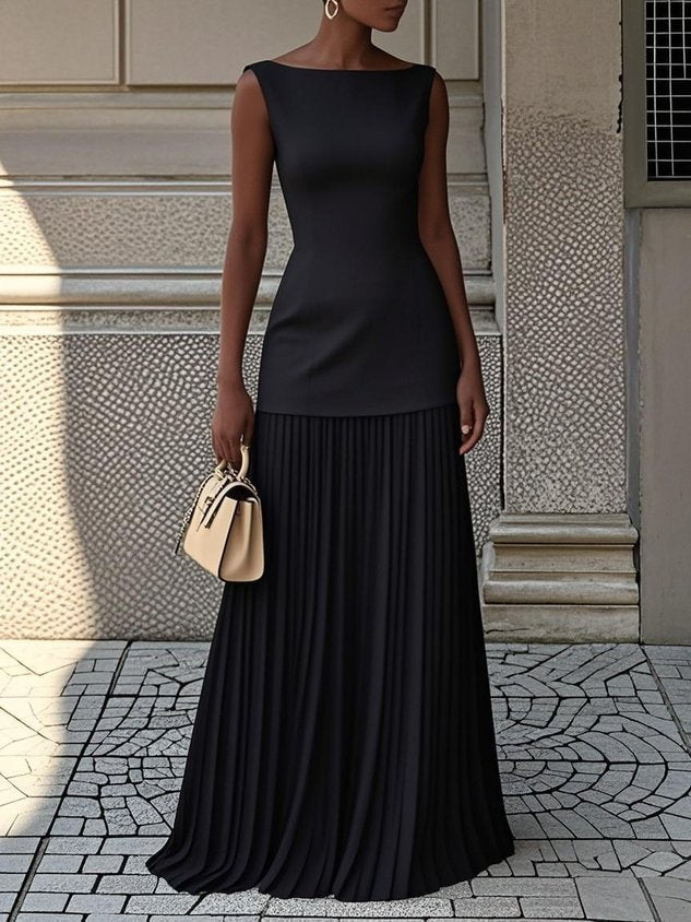 Nyra Atelier | Sleeveless Pleated Maxi Dress With Sleek Bodice And Flowing Skirt