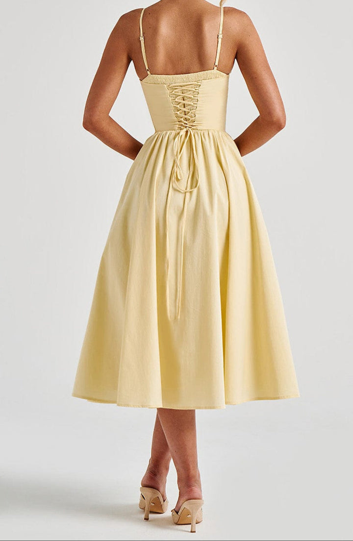 Yellow A-Line Midi Dress With Structured Corset Bodice Sweetheart Neckline And Side Pockets